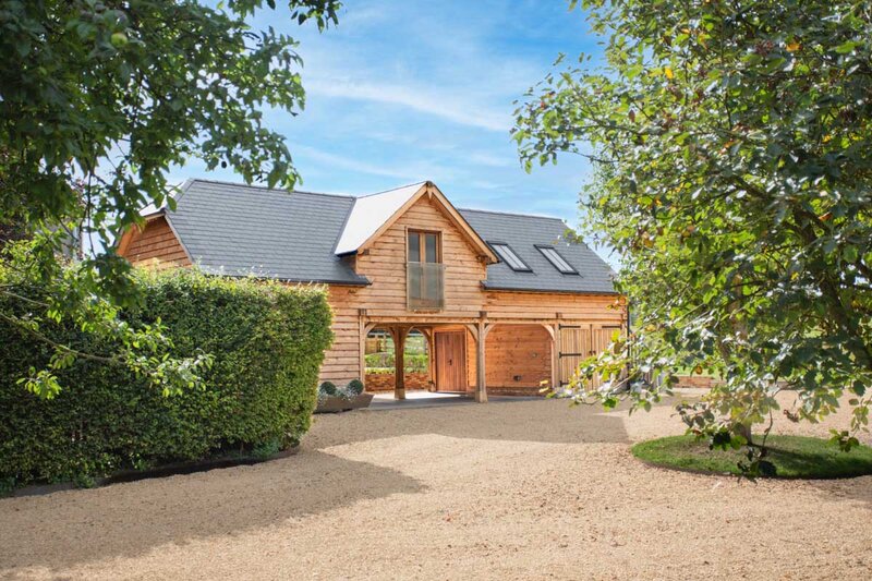 4 bay garage with annex above